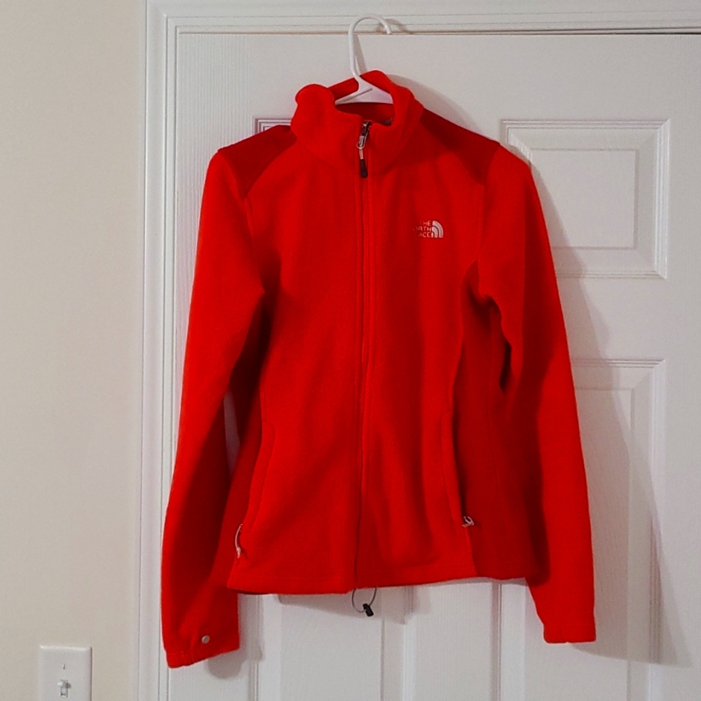 The North Face red/orange fleece jacket